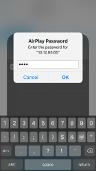 Zoom image: Enter the code shown on the Crestron touchscreen and tap OK