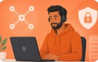 An IT staffer types with a headset on. 