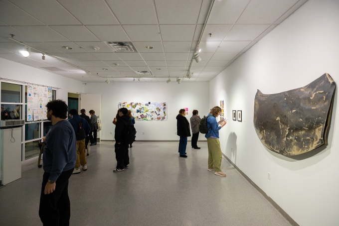 People looking at art in a gallery. 