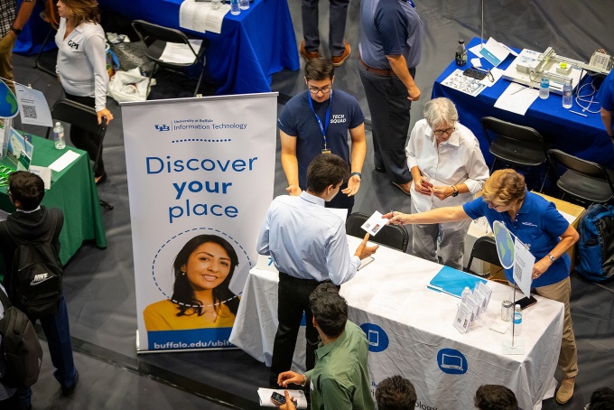 Attendees of a campus career fair at UB. 