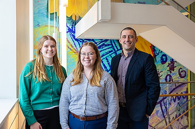 Graduate students Lauren Reinhart and Melissa Safford with GSE faculty member Ryan Creps. 