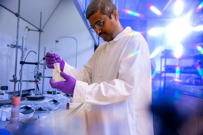 A researcher in a lab. 