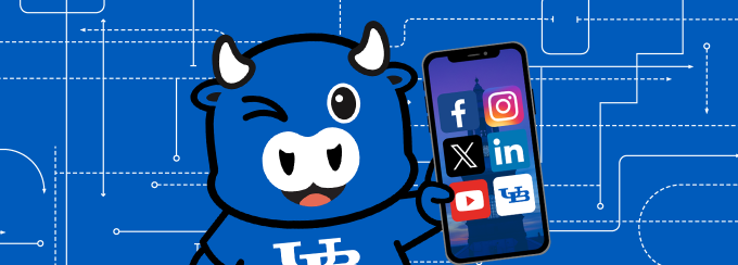 Victor Bull character holding a phone displaying social media apps. 