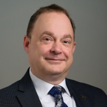 Headshot of James Austin. 