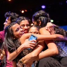 International student club members hug after wining International Fiesta competition. 