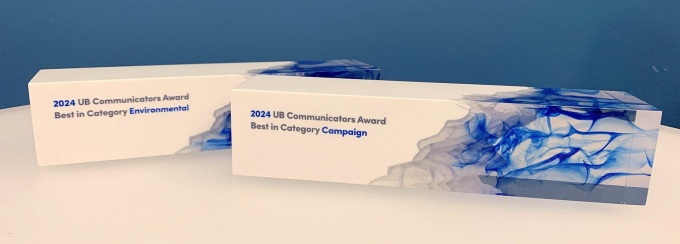White and blue Communicators Conference Awards for Best in Category Environmental and Campaign. 