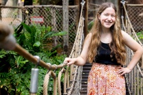 Student on rope bridge. 