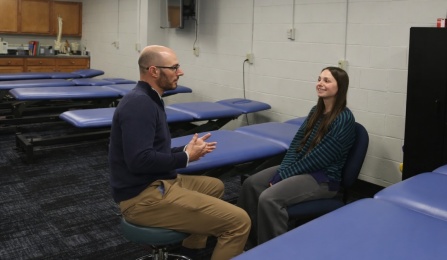 Long COVID patient working with a Physical Therapist. 